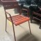 Lot de 22 fauteuils oranges style FERMOB avec accoudoirs