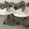 Table(s) ensacheuse(s) polyéthylène & inox, à 8 porte-sacs 