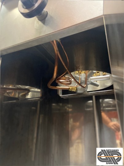 intérieur d'un module wok professionnel a gaz d'occasion rénové avec circuit gaz à neuf