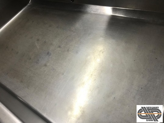 fond de plan de cuisson d'une sauteuse professionnelle d'occasion